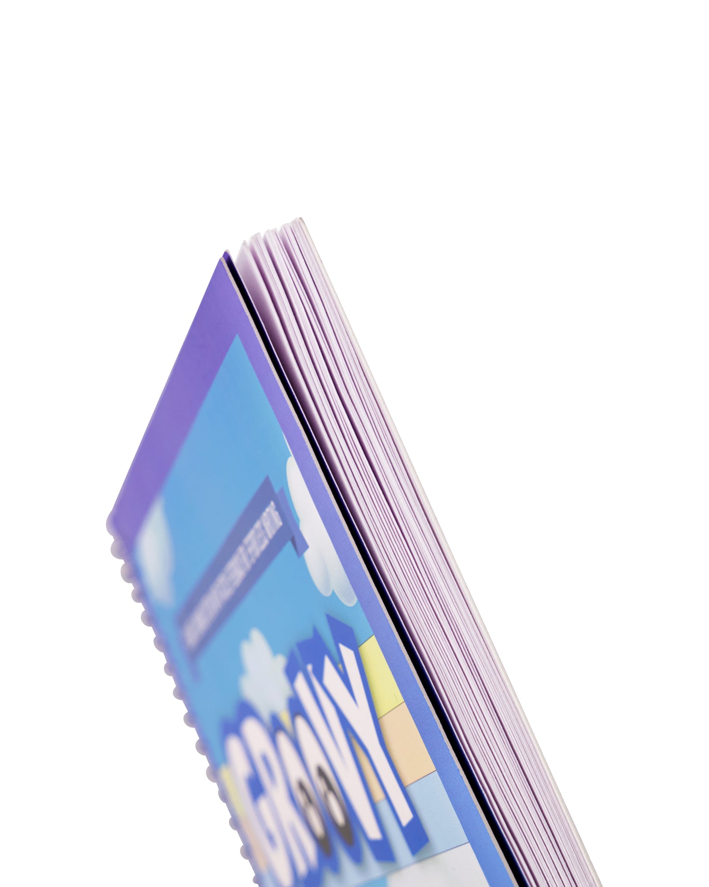 Side angle view showing the Alphabet Book’s thickness and spiral binding.